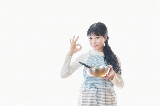 クッキング教室に通う若い女性 料理,フライパン,健康の写真素材