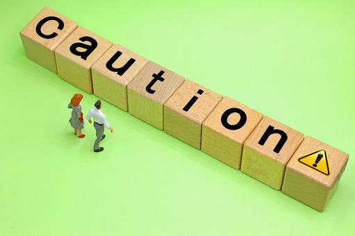 Cautionと書かれたブロック caution,注意,注意報の写真素材