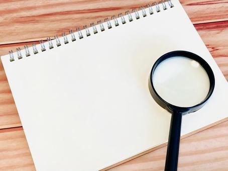 Magnifying glass and blank notebook, JPG