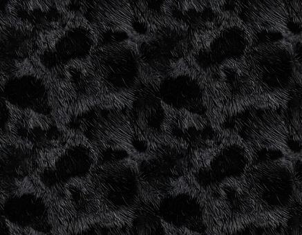 黒い斑点模様の毛皮 黒い斑点模様の毛皮の写真