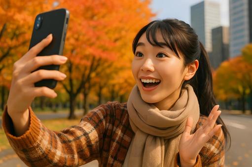 街角で自撮りする女性の写真