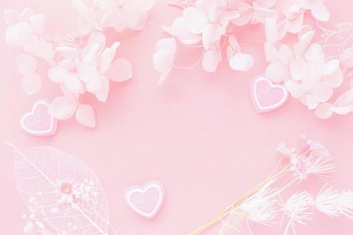 花とハートの背景の写真