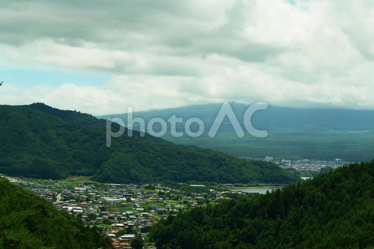 山々に抱かれた谷の町　富士河口湖町 富士河口湖町,町,山の写真素材