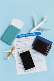 保険モチーフ　飛行機やパスケース 契約,申請,旅行保険の写真素材