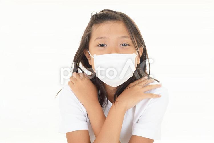 マスクを着用している女の子 子供,女の子,マスクの写真素材
