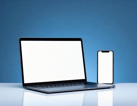 ノートパソコンと携帯電話 背景 ノートパソコンと携帯電話 背景の写真