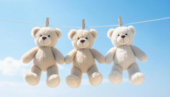 かわいいテディベア、天日干しの写真