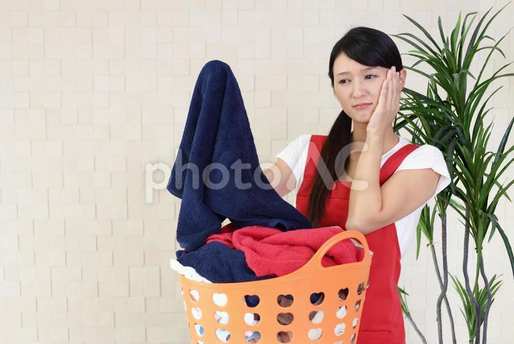疲れた表情の主婦 女性,女,主婦の写真素材