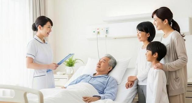 お見舞いに着た家族に説明をする看護師 お見舞いに着た家族に説明をする看護師の写真