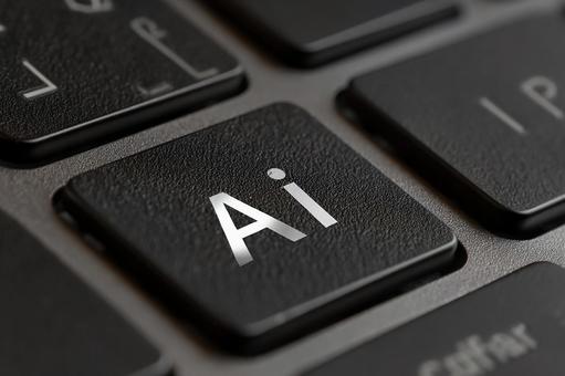パソコンのキーボードとAIのコンセプトの写真