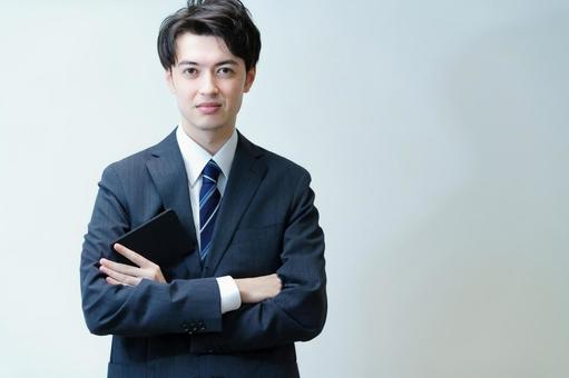 Young businessman posing with his arms crossed, businessman, male, good looking, JPG