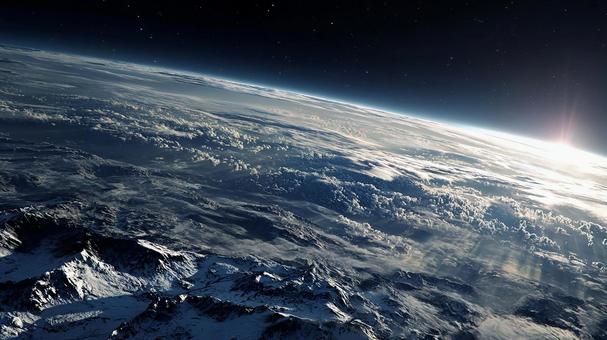 宇宙空間に浮かぶ美しい地球の遠景 宇宙空間に浮かぶ美しい地球の遠景の写真