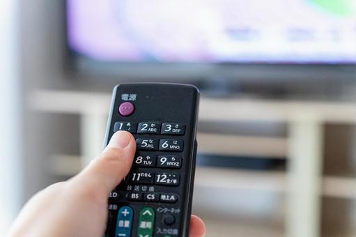 テレビのチャンネルを変えるの写真