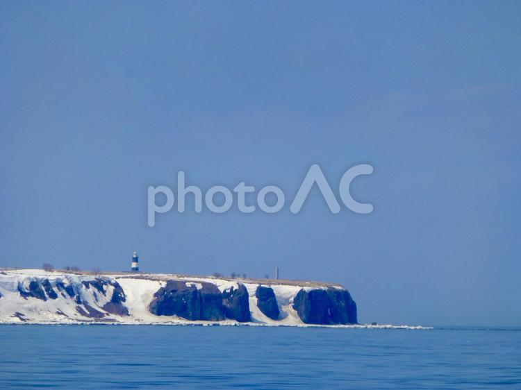 おぼろげな海と熊取岬 海,空,北海道の写真素材