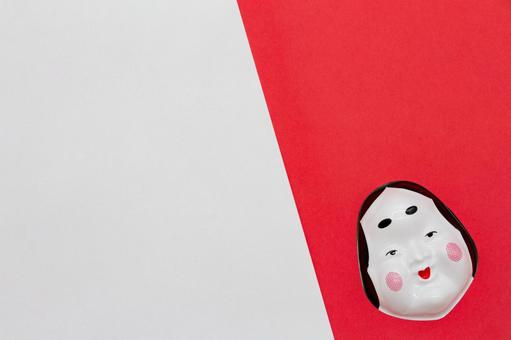 紅白背景におかめ 縁起物,おかめ,紅白の写真素材