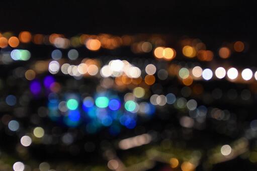 夜景がキラキラと輝く美しい玉ボケ﻿ 玉ボケ,夜景,光の写真素材