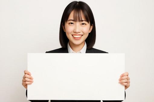 プラカードを持つ女性 プラカードを持つ女性の写真