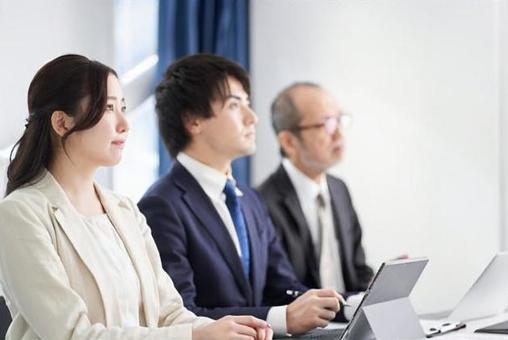 Asian business person listening to the seminar Asian business person listening to the seminar