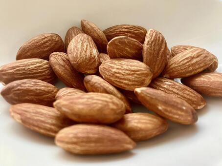 アーモンドのクローズアップ アーモンド,素焼きアーモンド,素焼きの写真素材