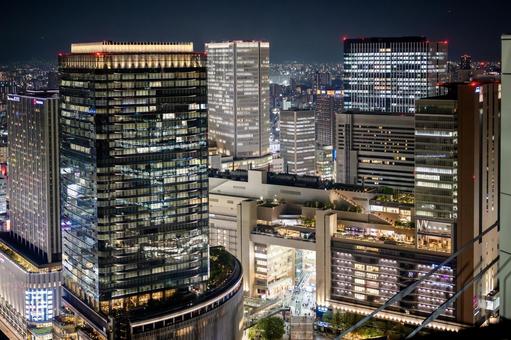 高層ビル群と光り輝く大阪梅田の夜景ビュー 高層ビル群と光り輝く大阪梅田の夜景ビュー 夜景,大阪,夜の写真素材