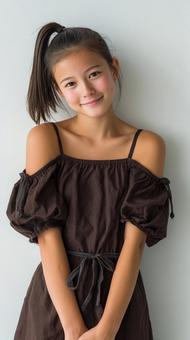 茶色のドレスを着た少女 茶色のドレスを着た少女の写真