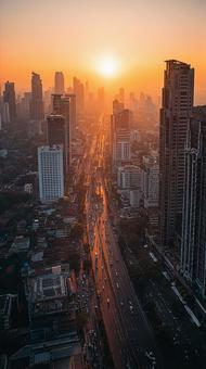 朝焼けの都市空撮の写真