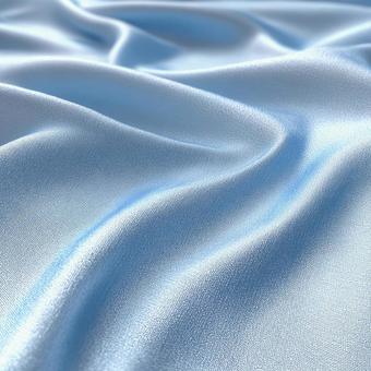 優雅な青い布の流れの写真