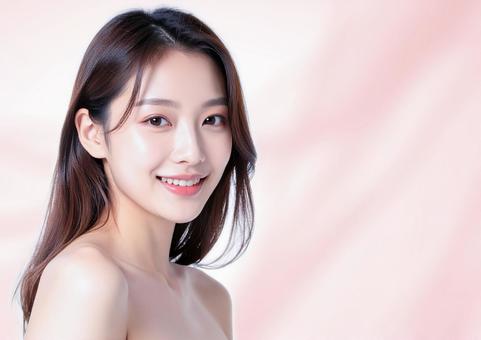 美容イメージ・微笑む女性(ピンク背景) 美容イメージ・微笑む女性(ピンク背景)の写真