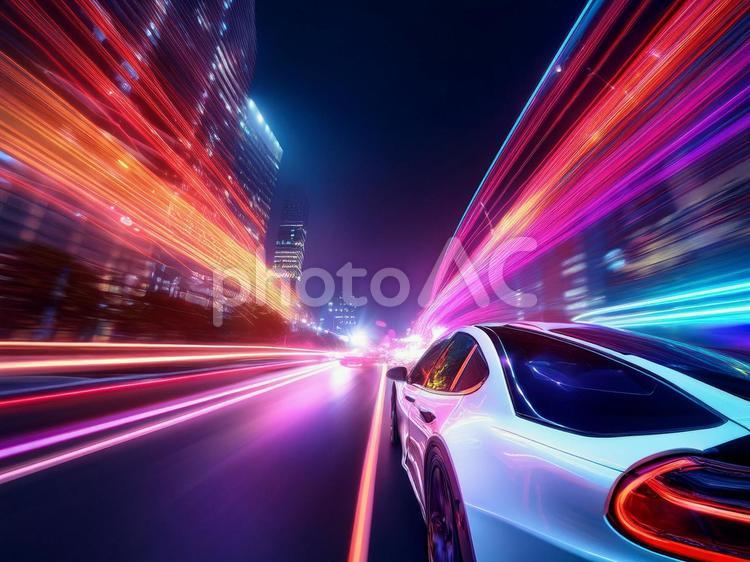 夜の都会を走る車　街灯とネオンの光3 車,クルマ,自動車の写真素材