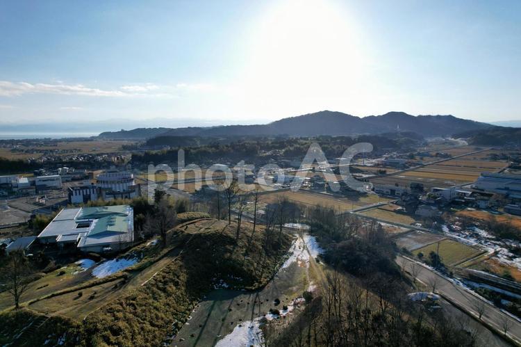 冬の氷見柳田布尾山古墳の空撮 古墳,富山,前方後方墳の写真素材