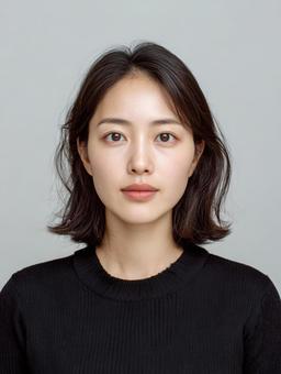 証明写真風な構図の正面を向いた女性 証明写真風な構図の正面を向いた女性の写真