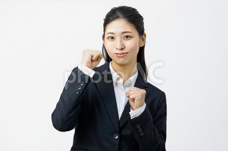 ガッツポーズ　女性社員　仕事　ビジネス ビジネスウーマン,スーツ,女性の写真素材