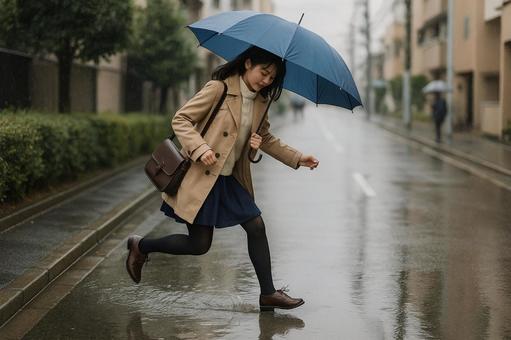 雨の日に水たまりを跳ぶ 雨の日に水たまりを跳ぶの写真