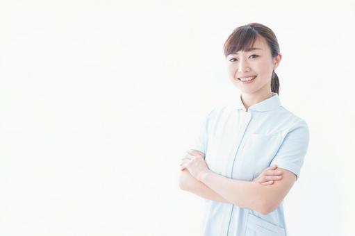 自信がある若い看護師 自信がある若い看護師 耳鼻科,勇気,ナースの写真素材
