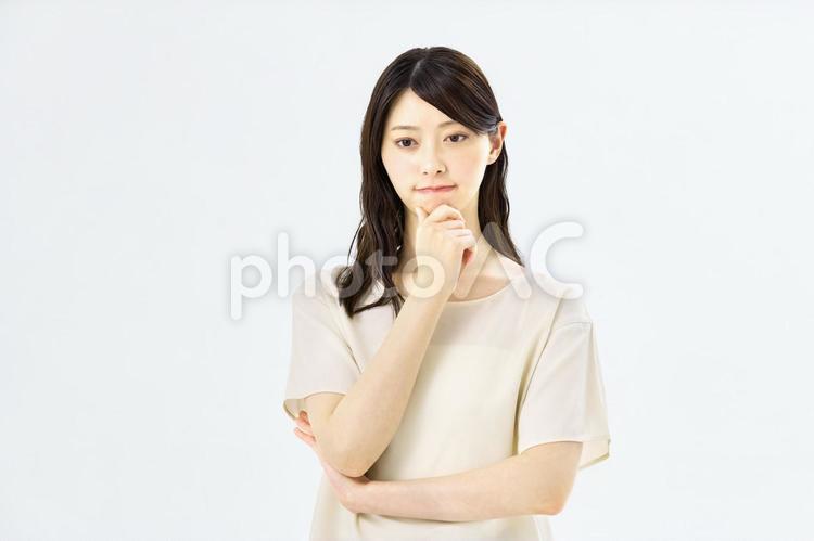 困る女性　主婦　ビジネスウーマン　若い ビジネスウーマン,女性,困るの写真素材
