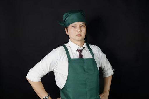真剣な表情の料理スタッフ 真剣な表情の料理スタッフ 男性,店員,調理スタッフの写真素材