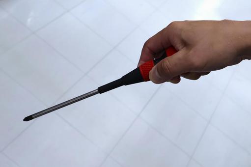 プラスドライバーを持つ男性 DIY工具 プラスドライバーを持つ男性 DIY工具 プラスドライバー,diy,工具の写真素材