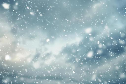 雪が舞う幻想的な背景 雪が舞う幻想的な背景の写真