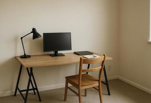 シンプルなデスクと椅子がある部屋の写真