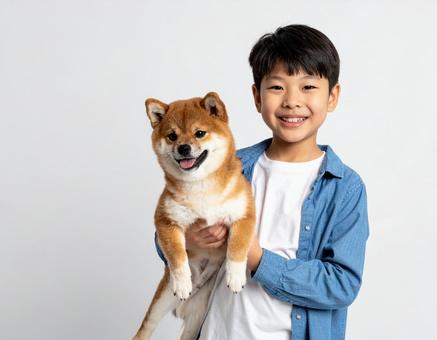 犬と子供 犬と子供の写真