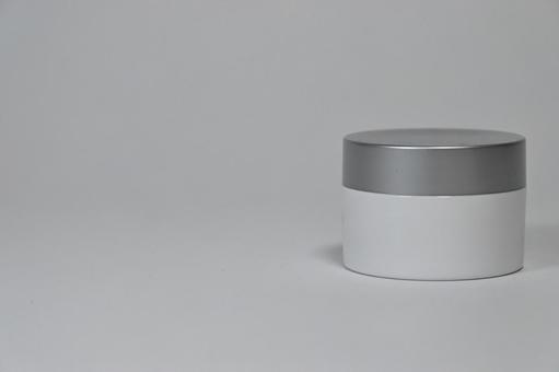 White cream jar with grey cover, JPG