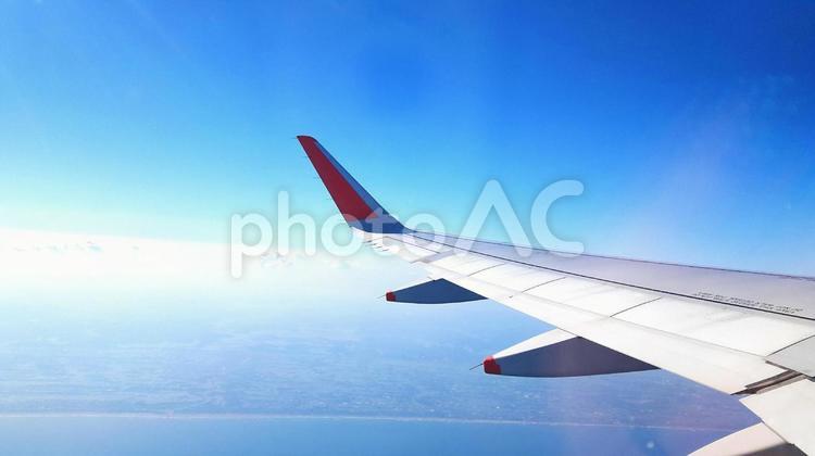 飛行機の窓からの眺め 飛行機,空,羽の写真素材
