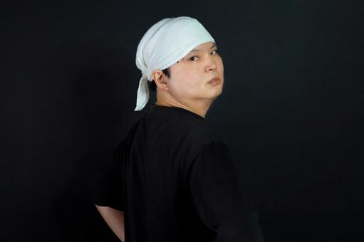 白い手ぬぐいの男性特写 白い手ぬぐいの男性特写の写真