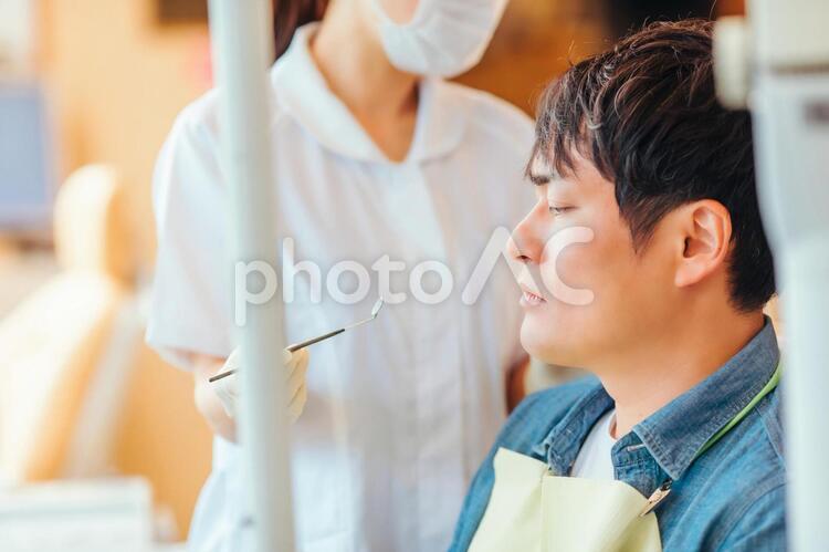 歯科衛生士と患者 歯医者,歯科医院,歯科助手の写真素材