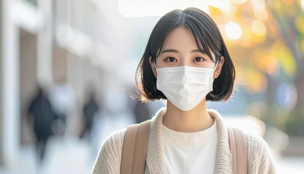 マスクをつける人 マスクをつける人の写真