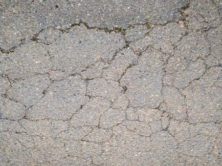 ひび割れた地面 ひび割れ,地面,道路の写真素材