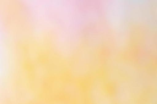 ピンクとオレンジの淡いグラデーション背景 背景,素材,ぼかしの写真素材