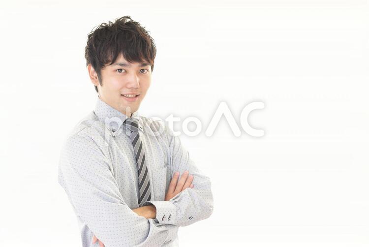 腕組をするビジネスマン 男性,ビジネス,ビジネスマンの写真素材