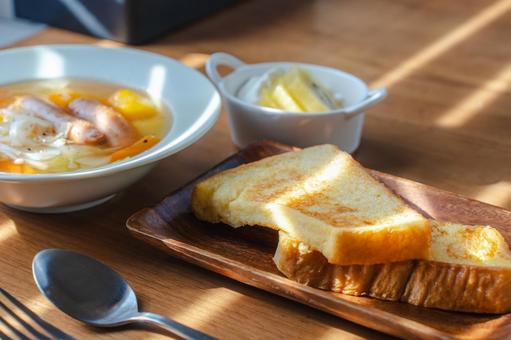 A Western-style breakfast featuring French toast and soup, JPG