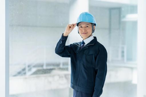 作業服のビジネスマン 作業服のビジネスマンの写真